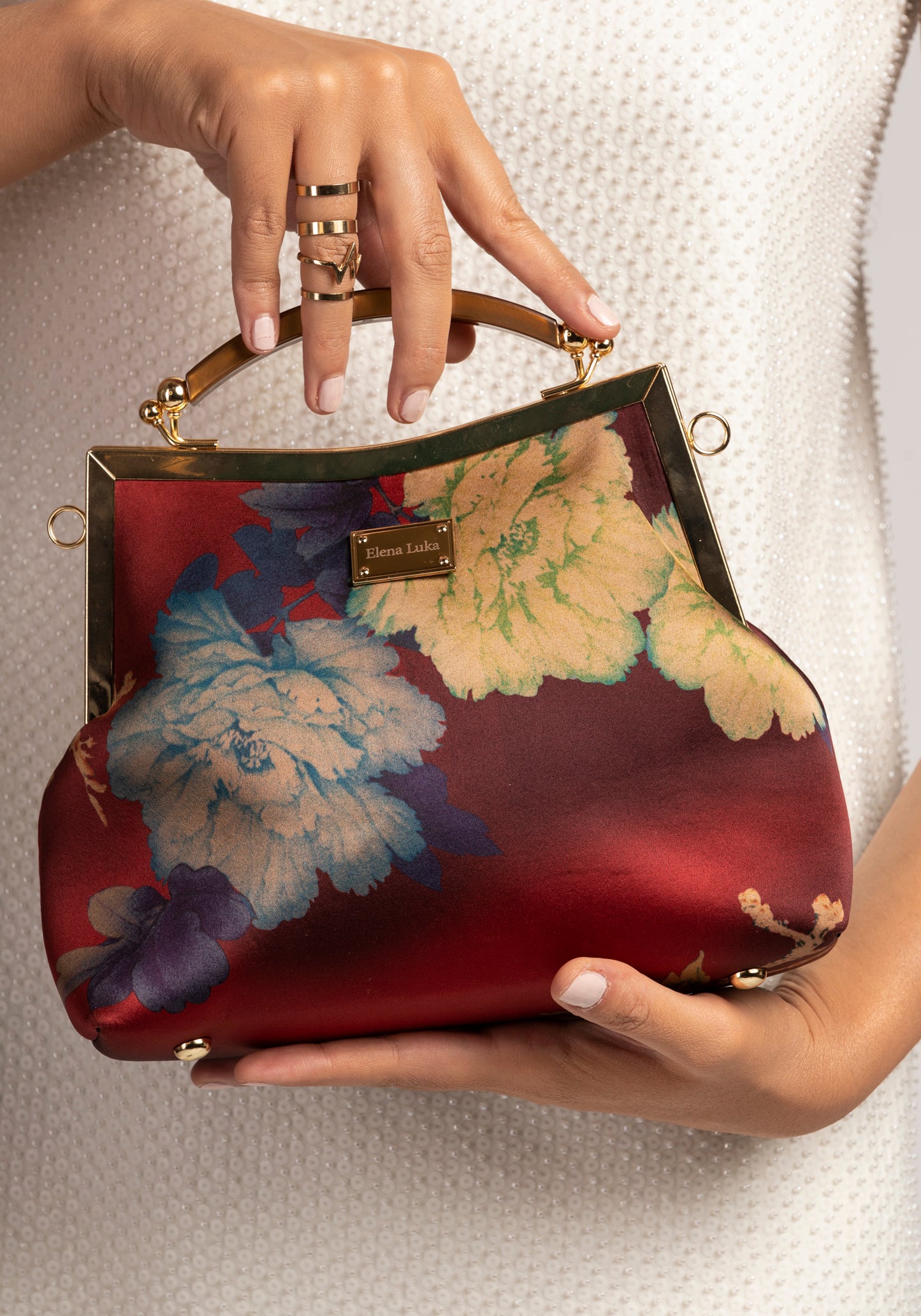 Dark red luxury handbag