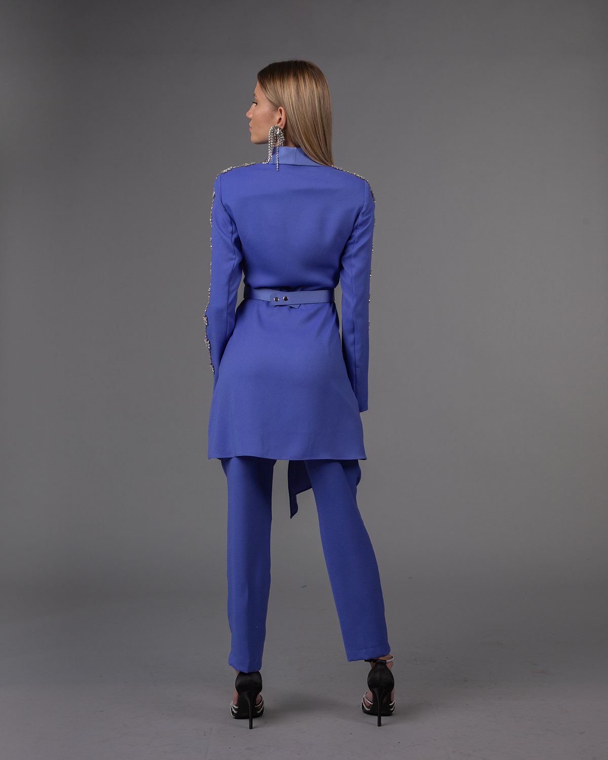 Two piece suit with decorated sleeves