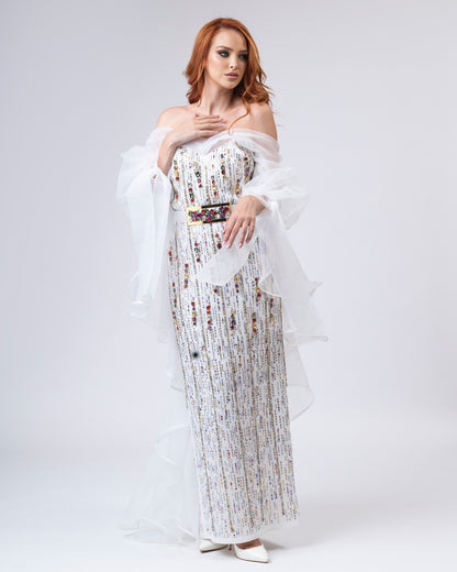 Strikingly decorated white dress