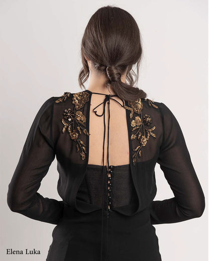 Black cocktail dress with gold lace