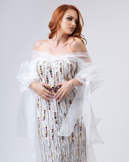 Strikingly decorated white dress