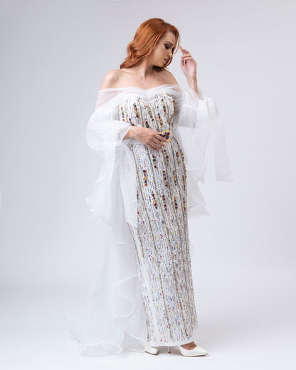 Strikingly decorated white dress
