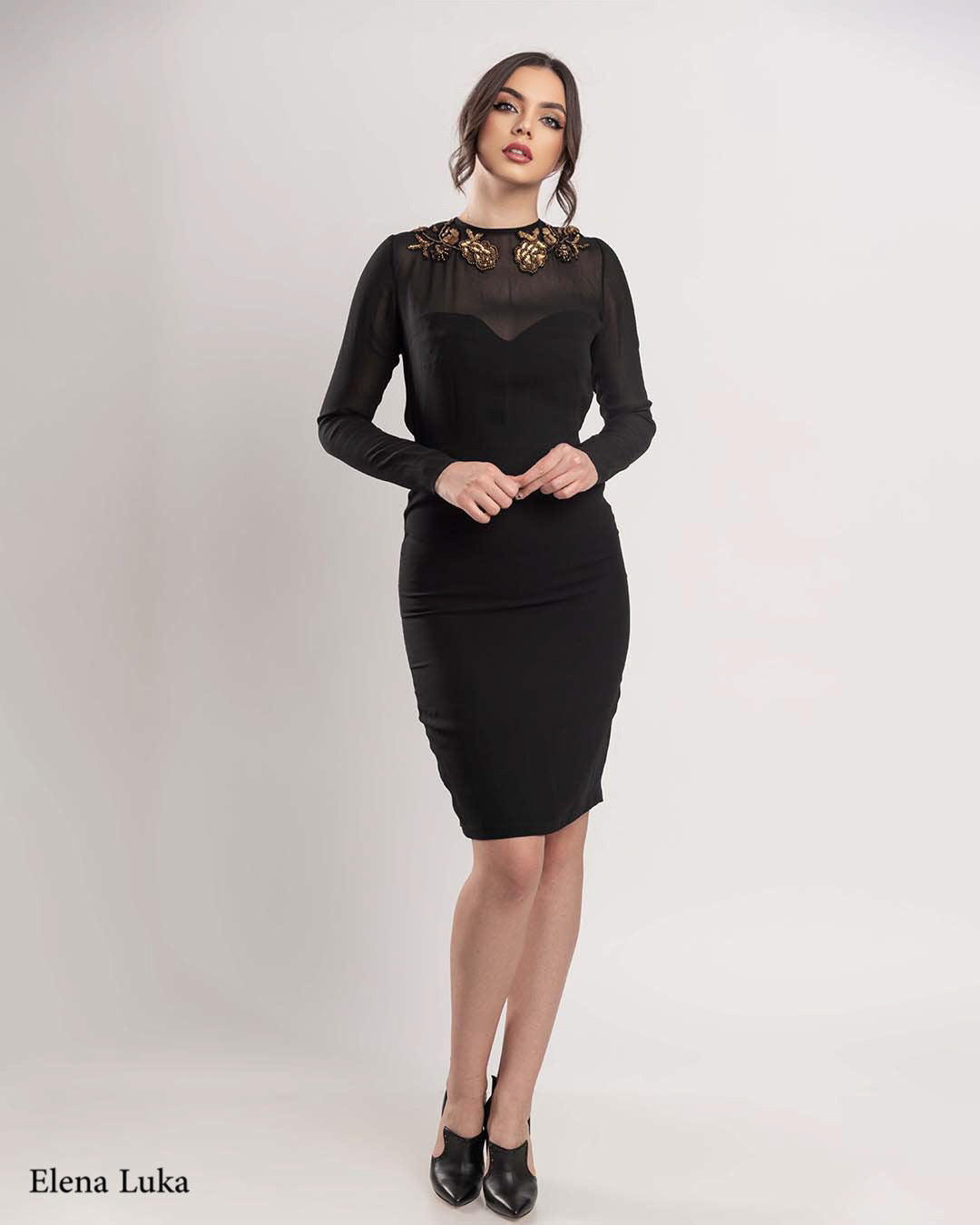 Black cocktail dress with gold lace
