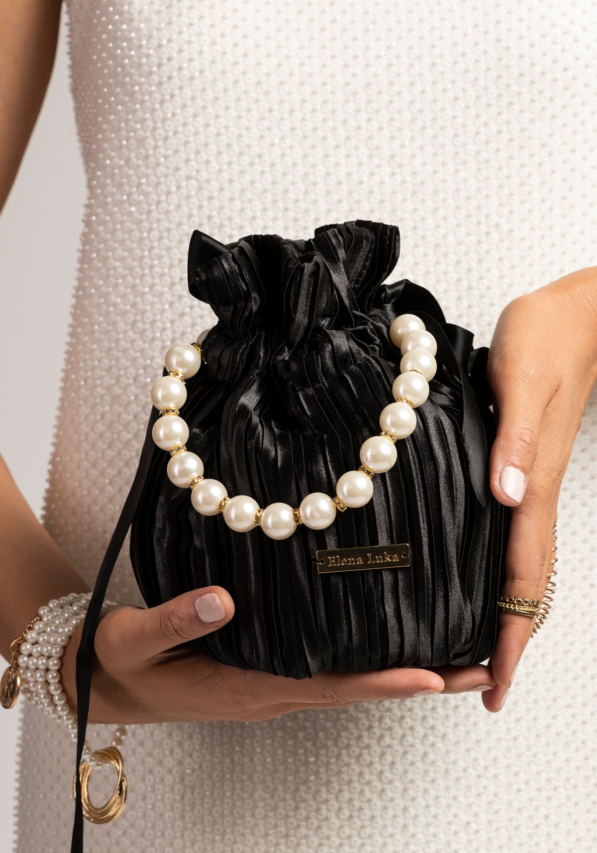 Luxury black pouch handbag with pearls