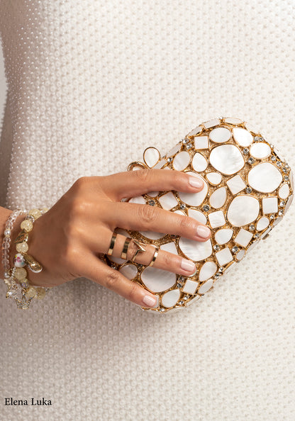 White and gold luxury handbag