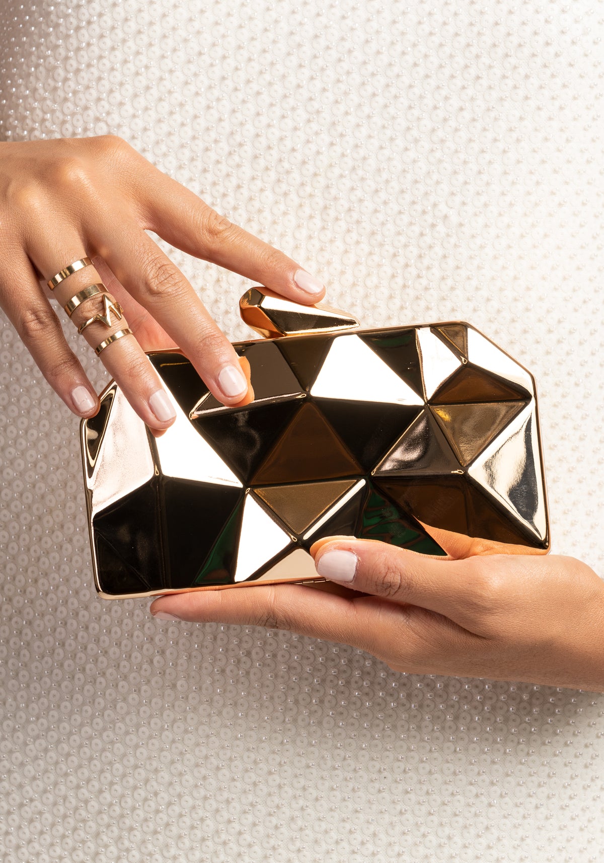 Golden geometrical luxury handbag