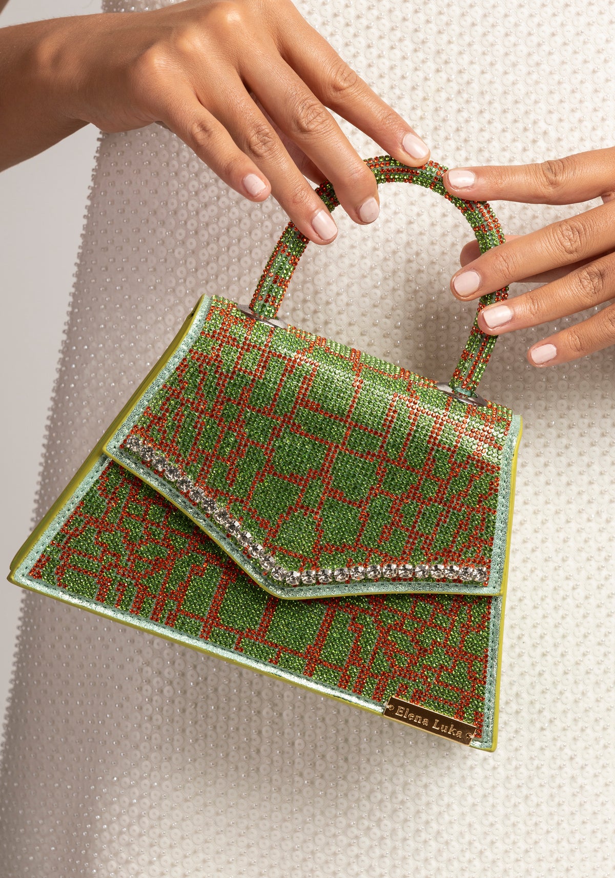 Ornate green gemstone bag